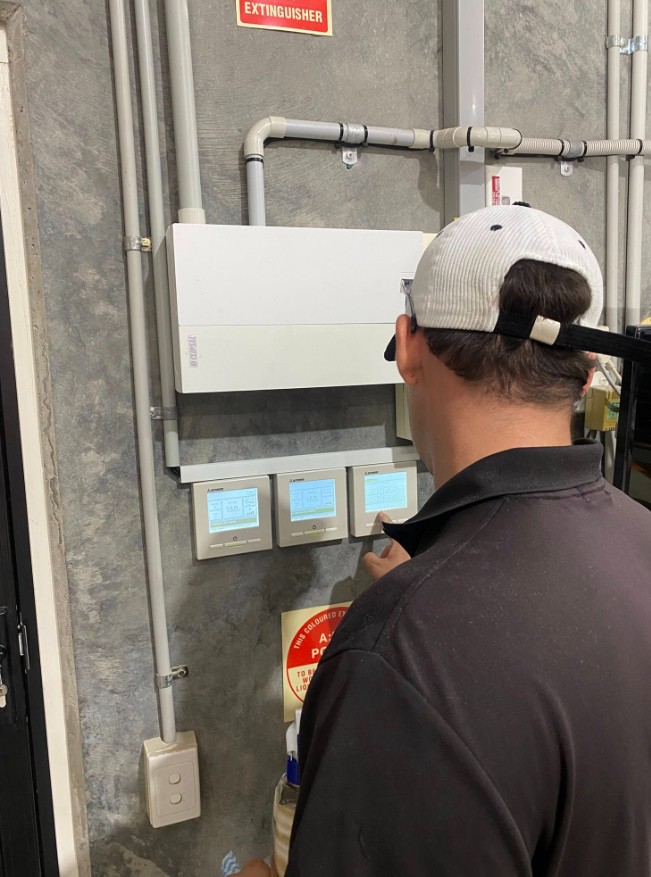 Technician performing maintenance